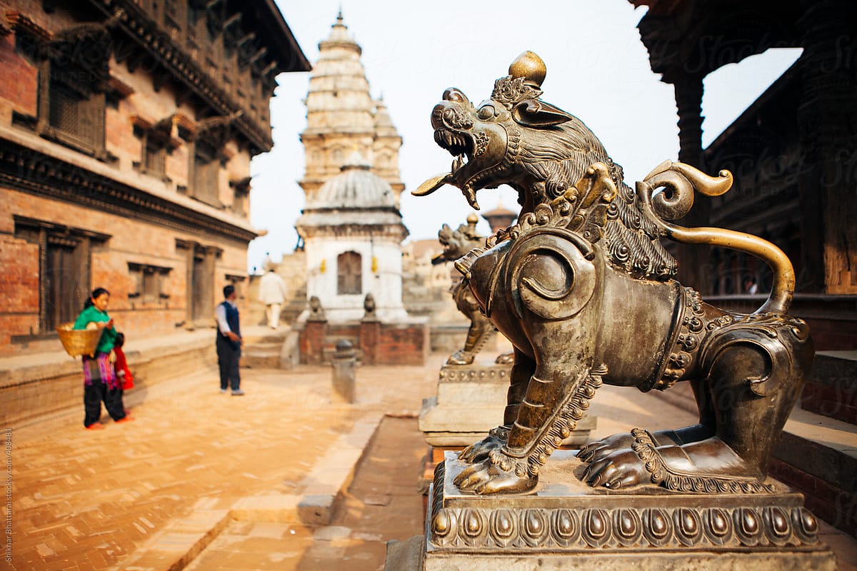 Metal statue of Lion guarding temple in Bhaktapur Durbar Square.