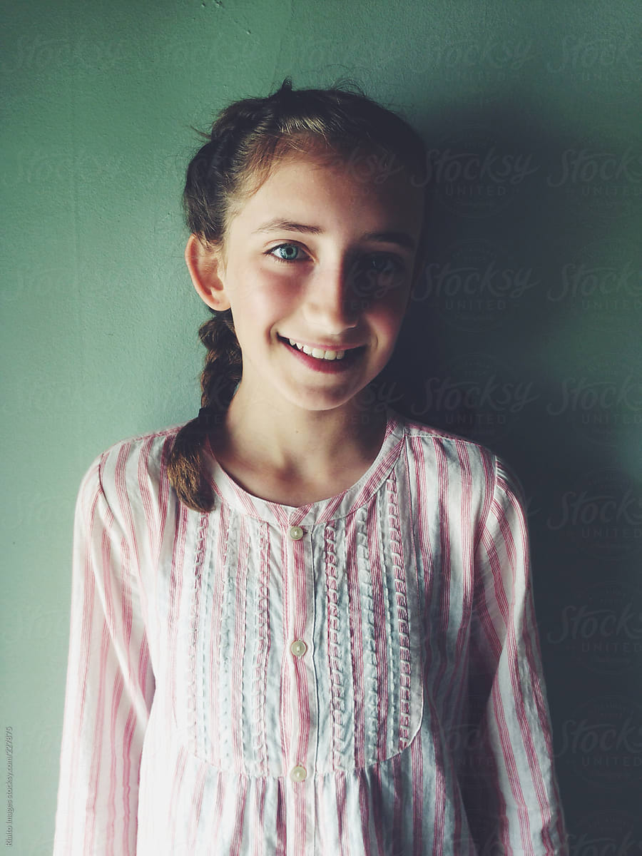 Portrait Of Happy Eleven Year Old Girl By Rialto Images