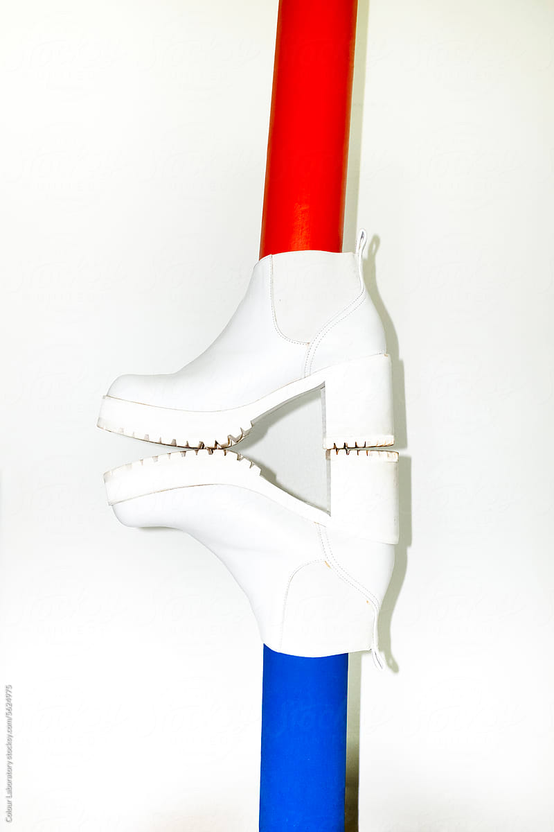 White platform boots and colorful tubes with hard direct flash