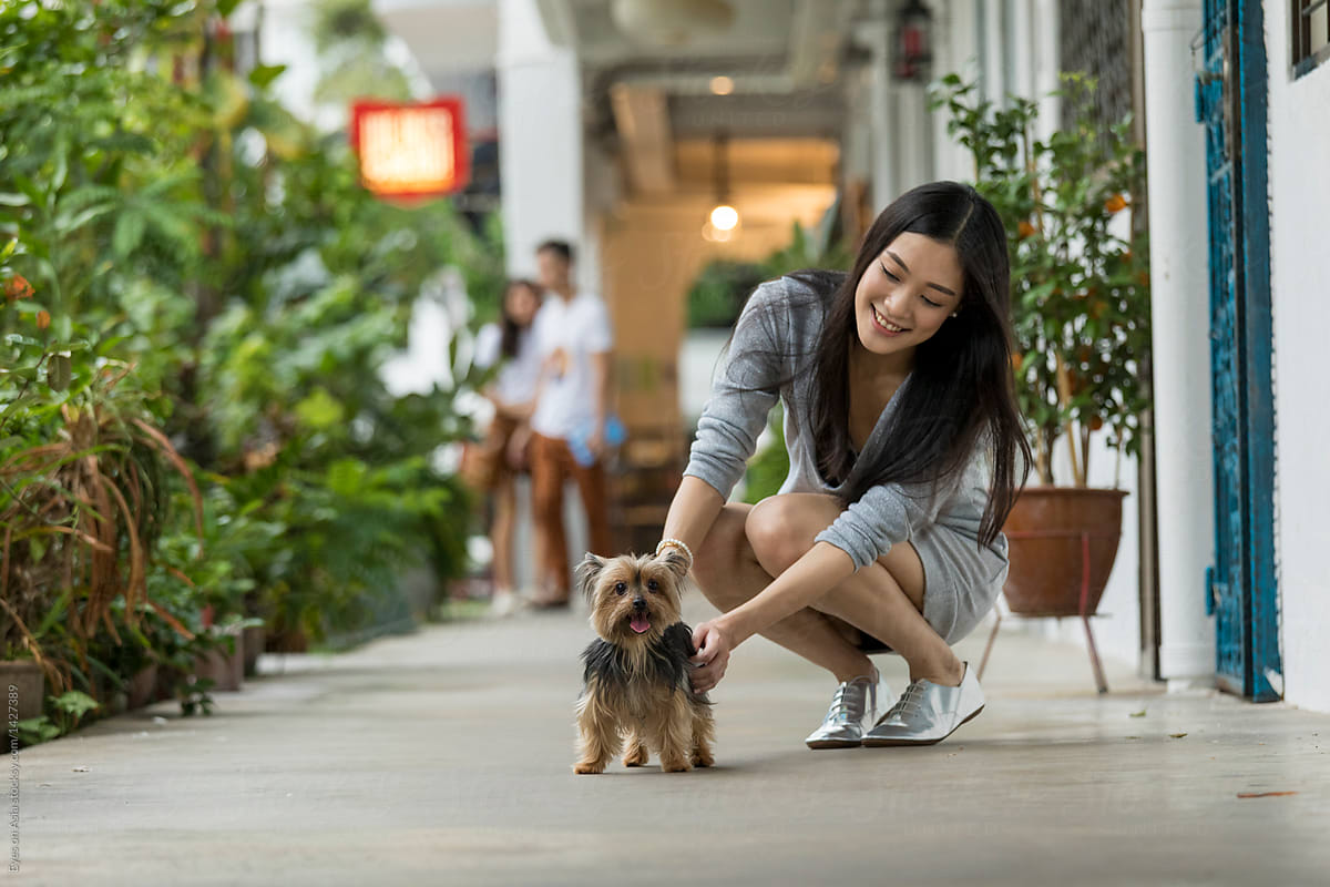 Asian Woman and her dog