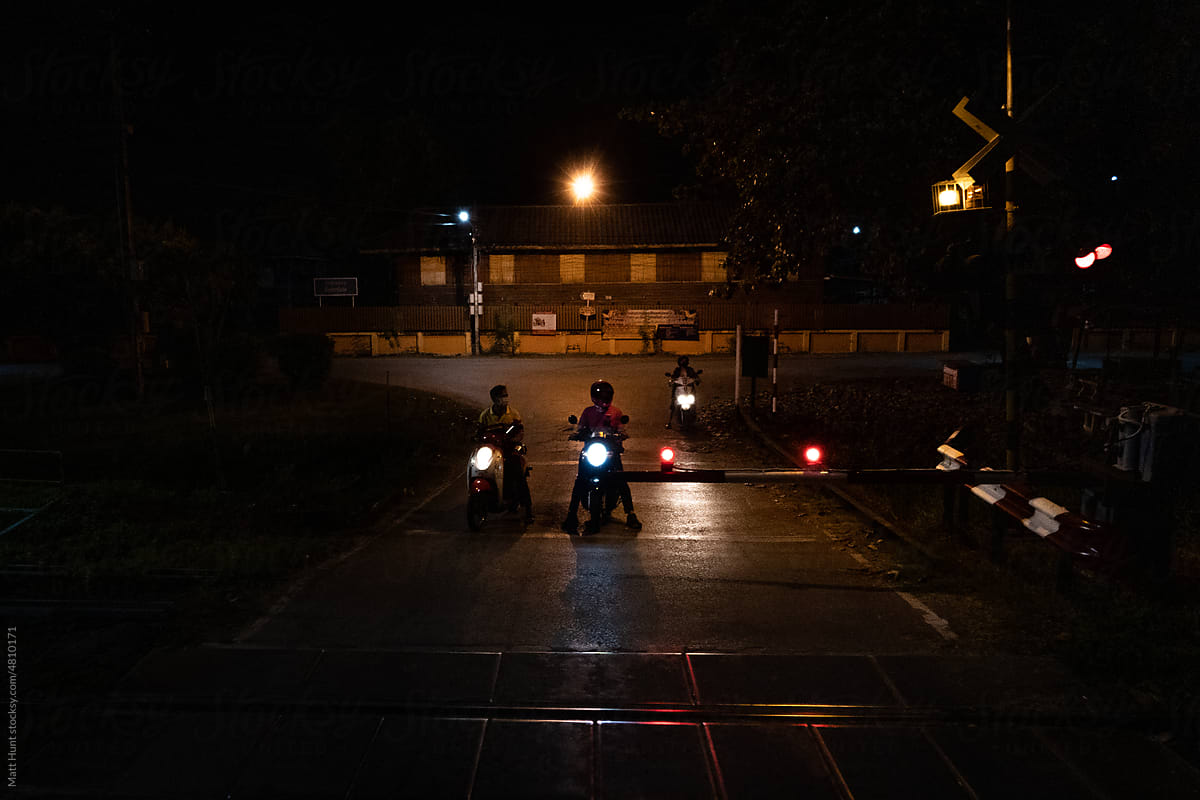 Motorcycles at a railroad crossing