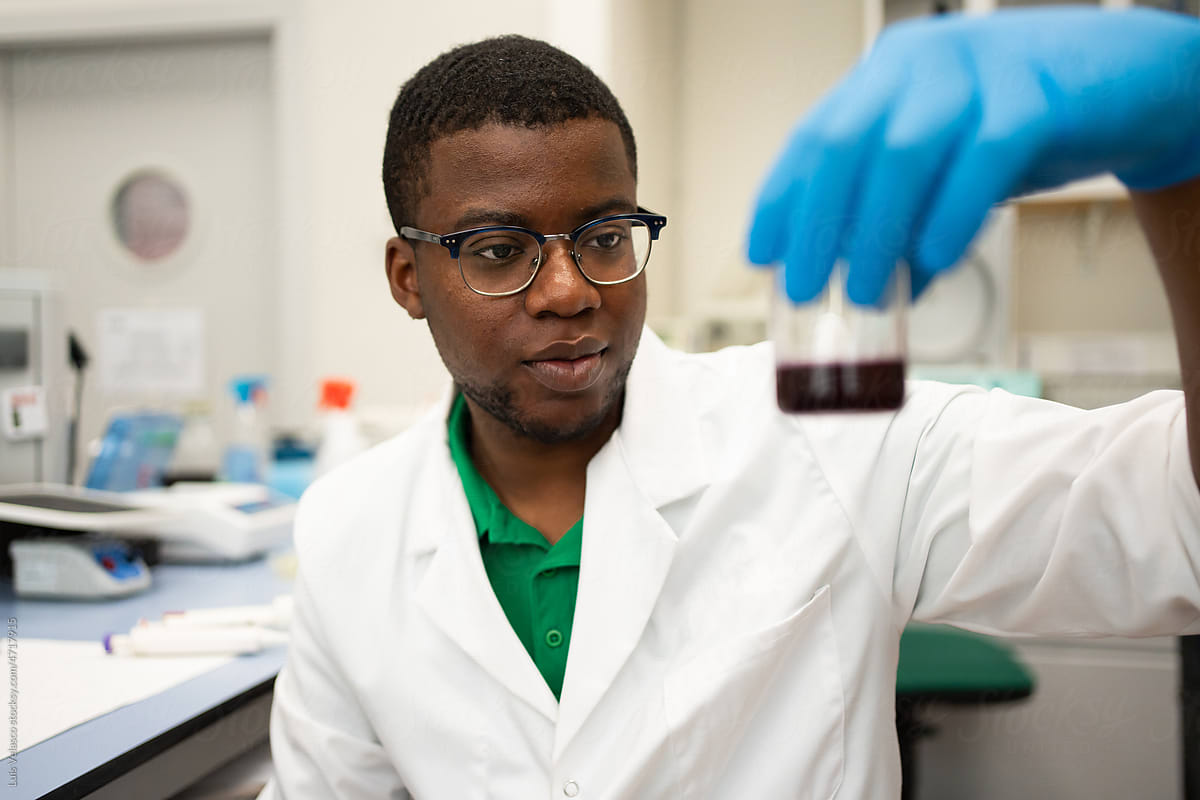 Black Scientist Working In A Science Project In The Lab.