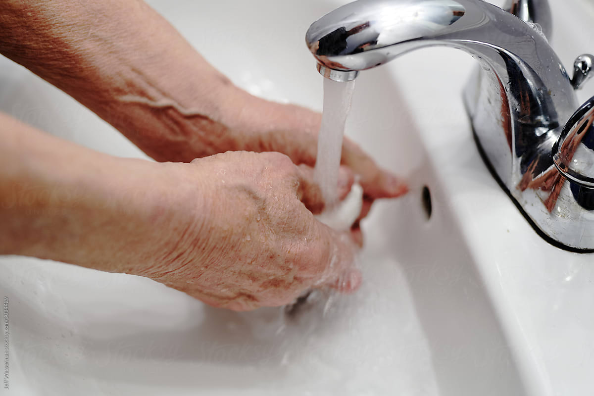 Elderly Man Washing Hands