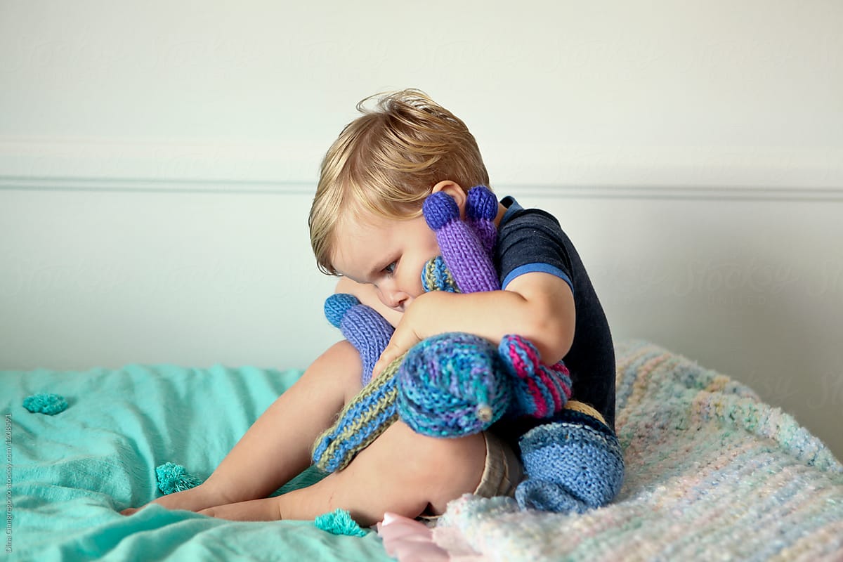 Toddler Boy Hugging Handmade Doll