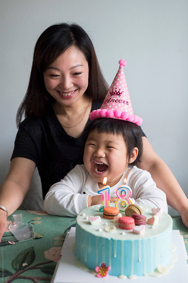 happy little girl with birthday cake