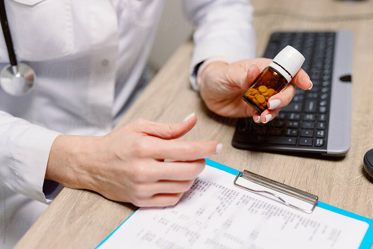 Anonymous doctor pill medicine treatment desk pharmacy medicament
