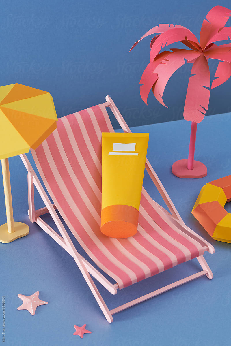 Sunblock tube mockup decorated with miniature beach