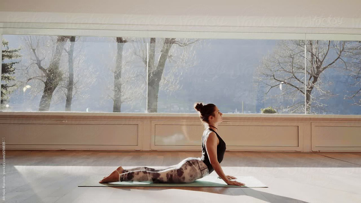 Woman Doing Yoga By Stocksy Contributor Michela Ravasio Stocksy