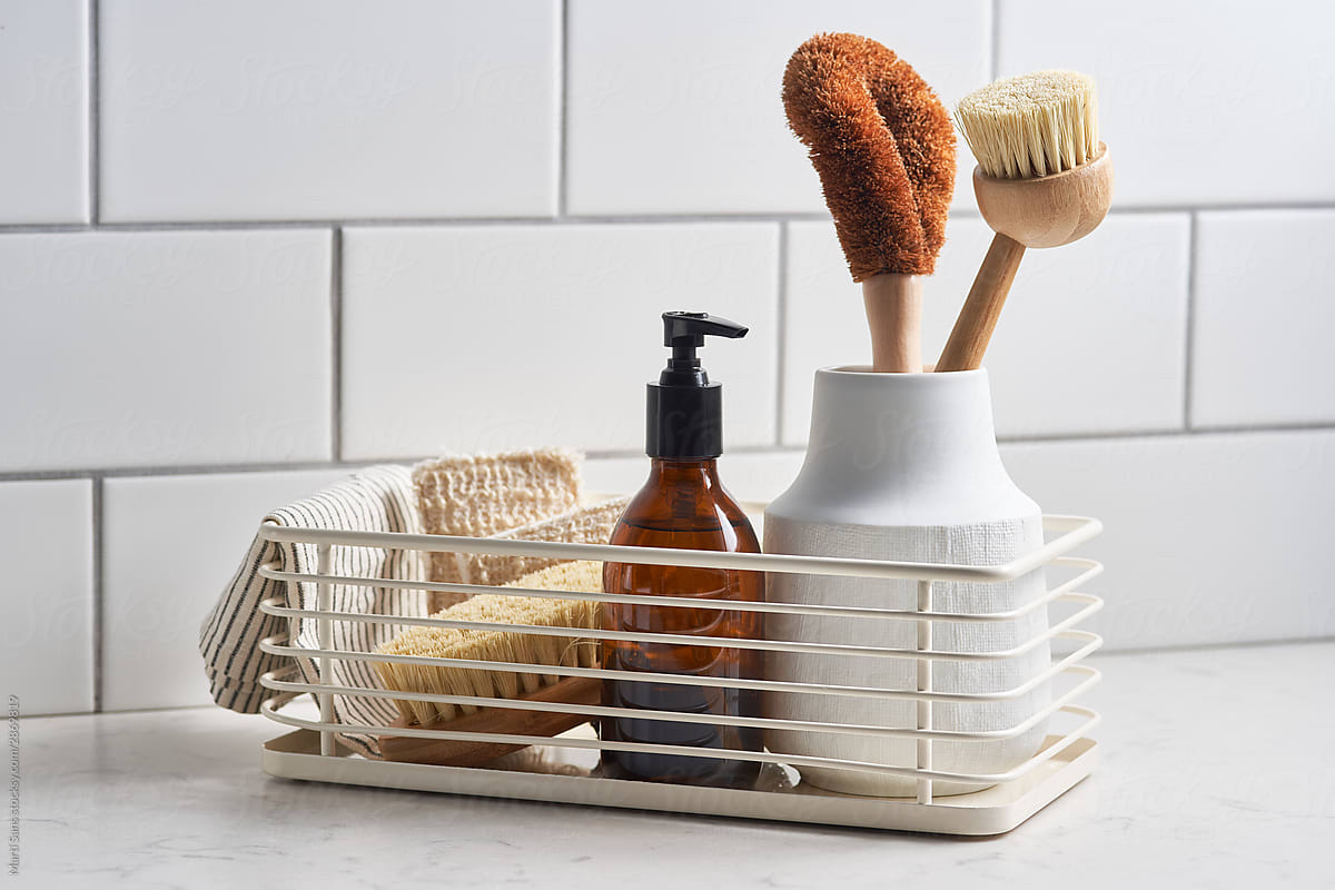 Zero waste detergent and brushes near wall