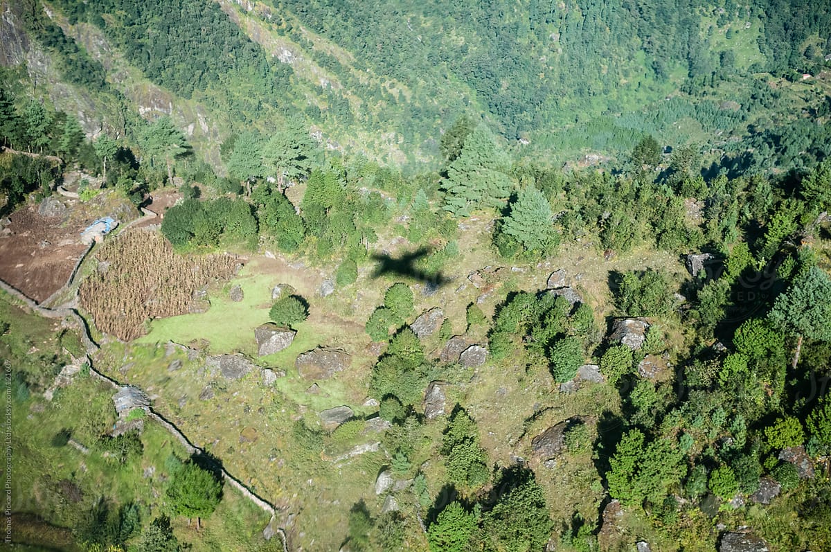 Shadow of a plane on the foothills immediately below Lukla Airport, Everest Region, Nepal.