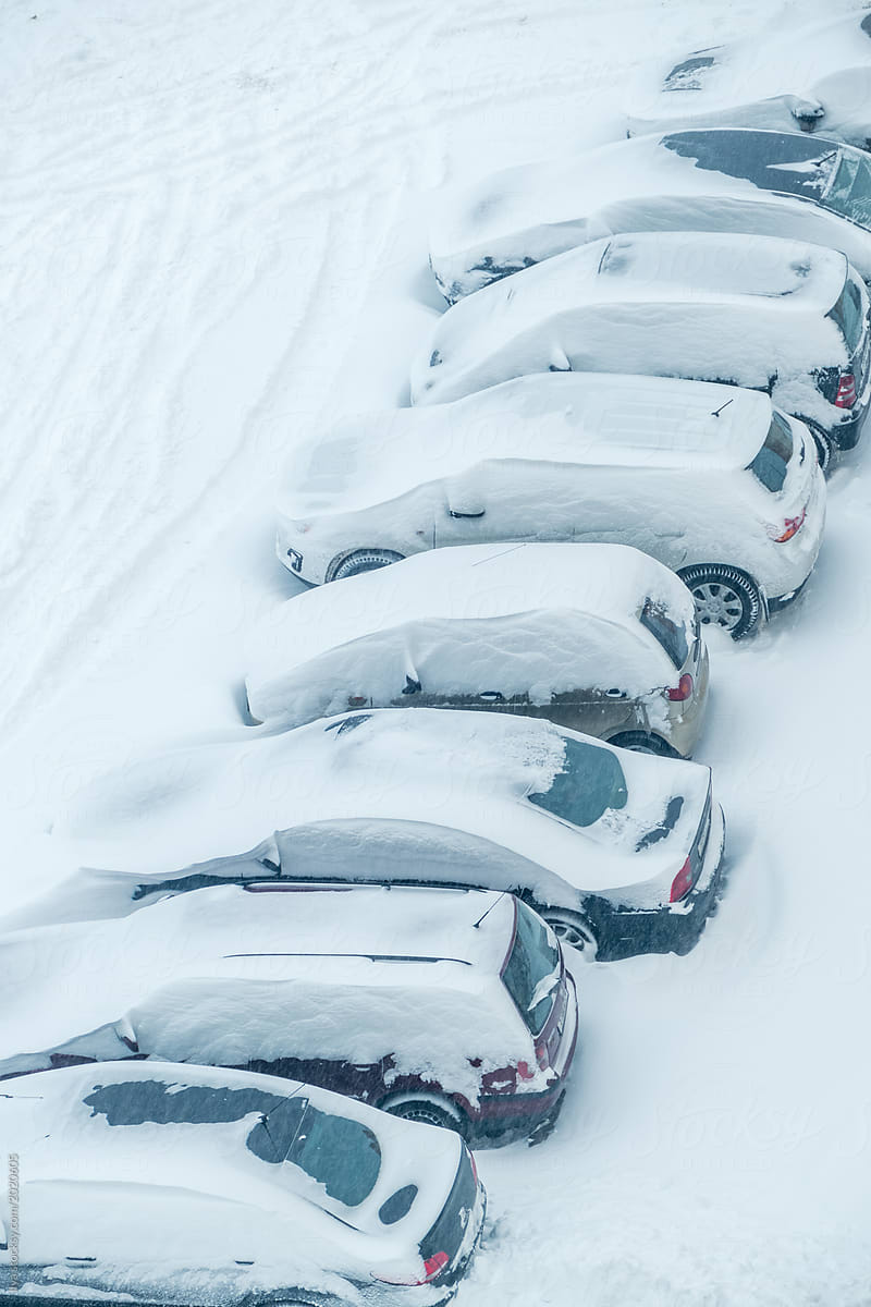 Cars winter snow parking lot