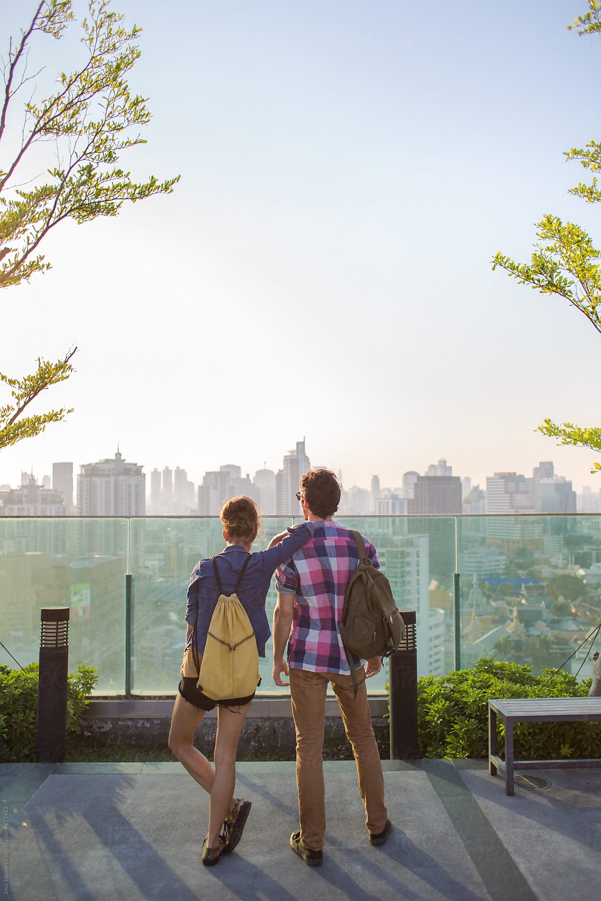 Friends Standing Together Looking At The City View By Stocksy Contributor Jovo Jovanovic