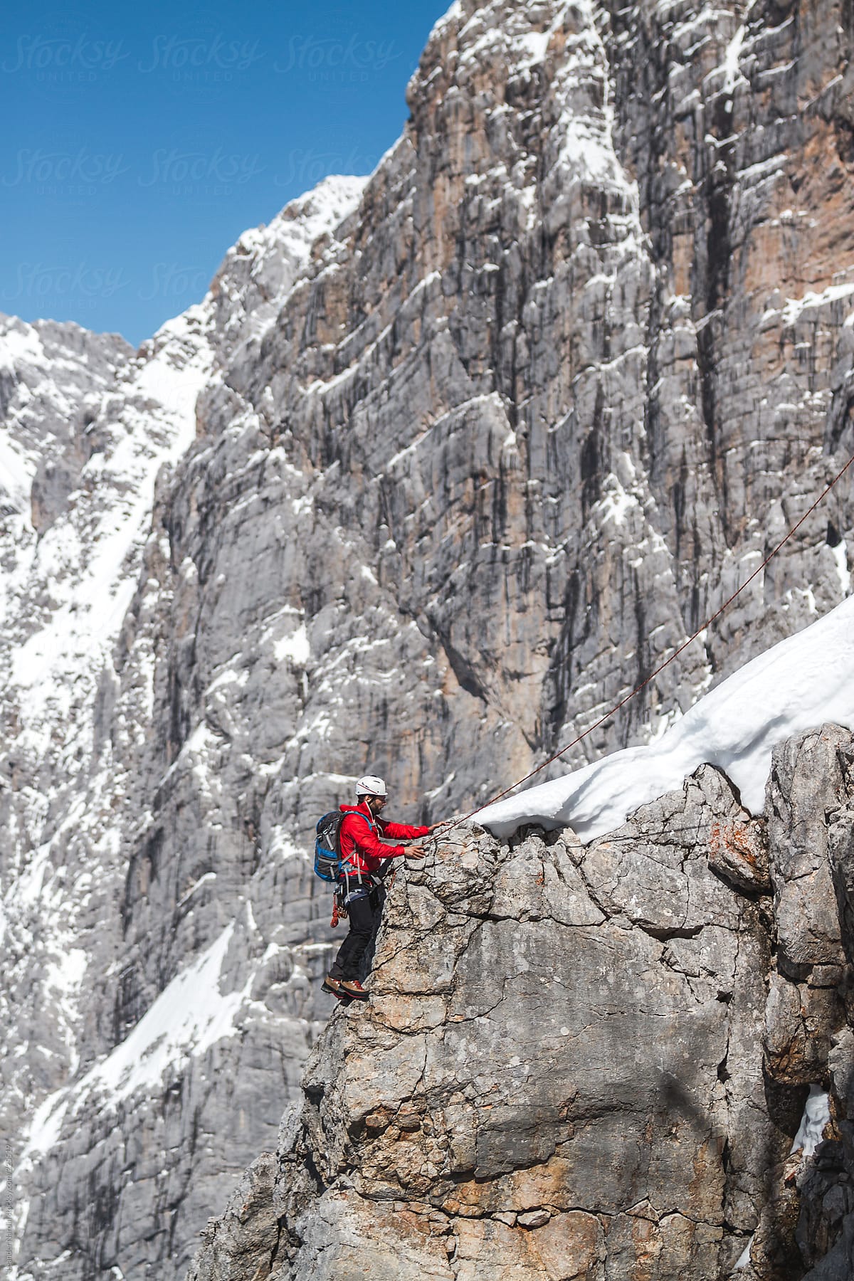 mountain climber in high alpine terrain
