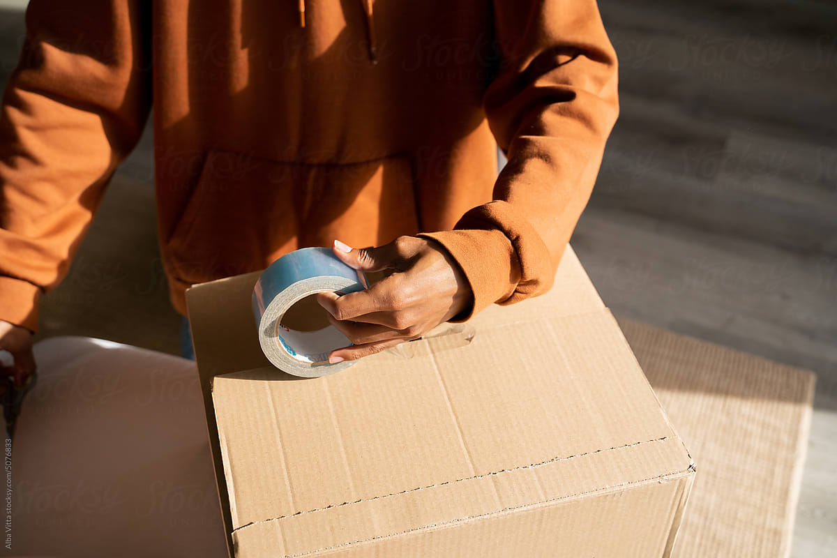 Man packing delivery online purchase