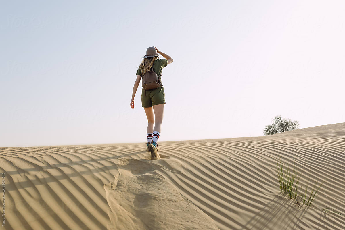 Woman on sand dunes