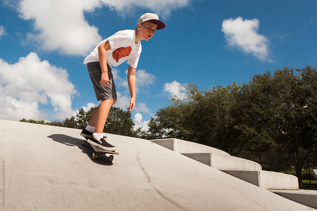 Boy RIding Skateboard on Ramp