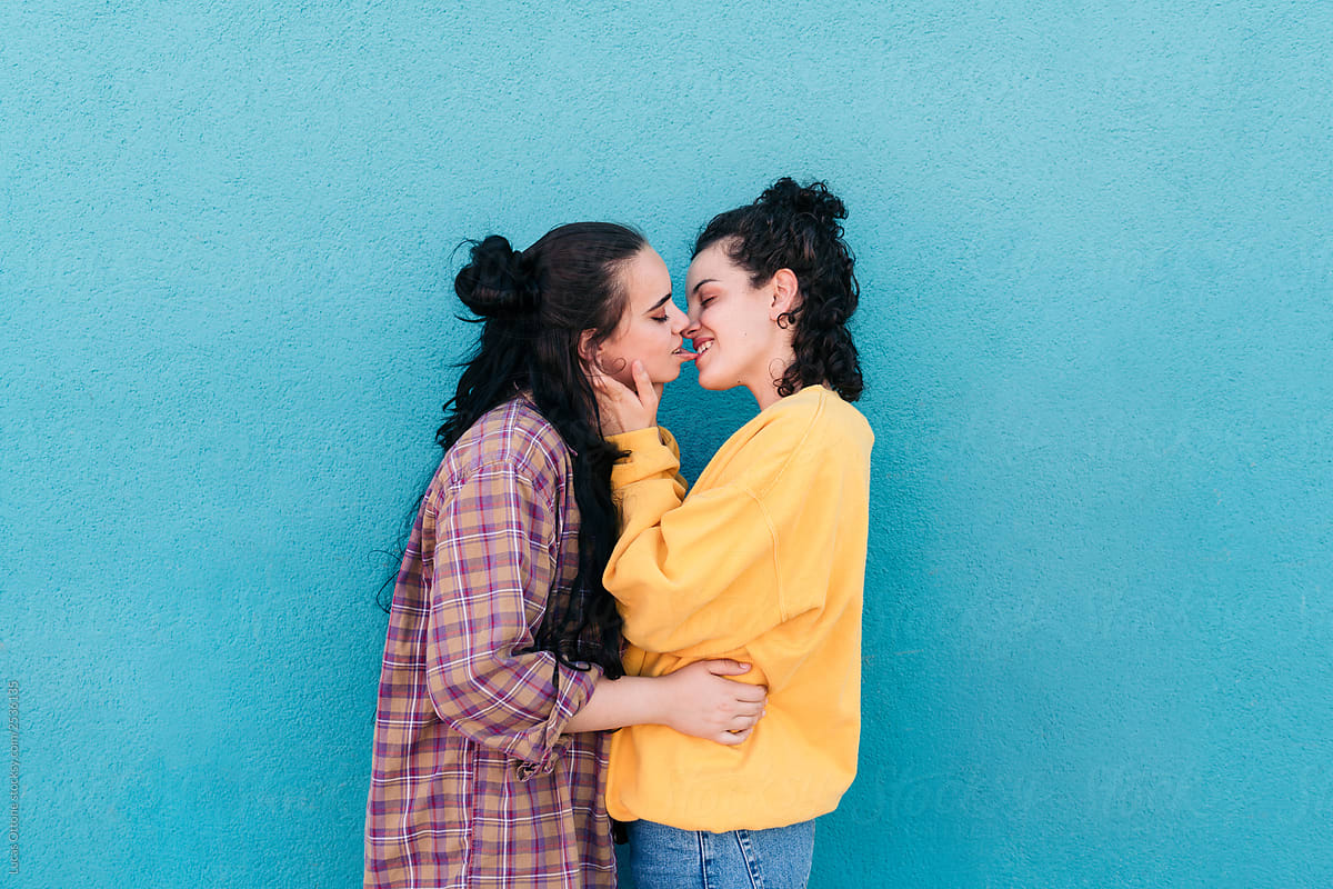 Young Women Kissing By Stocksy Contributor Lucas Ottone Stocksy