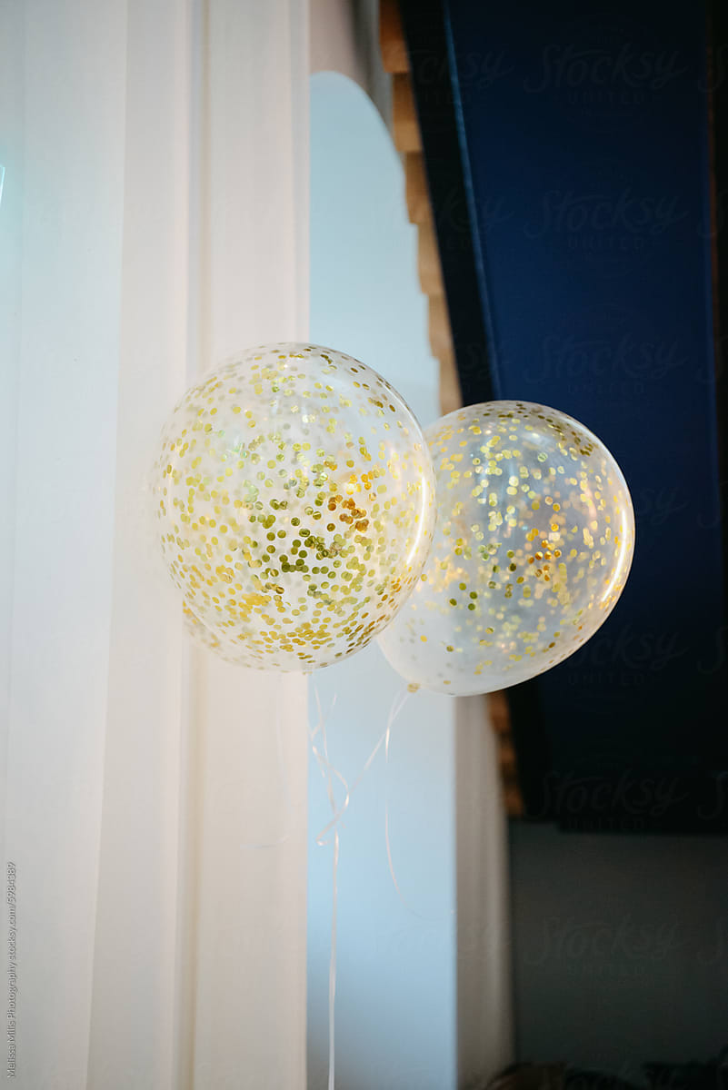 Two helium confetti balloons