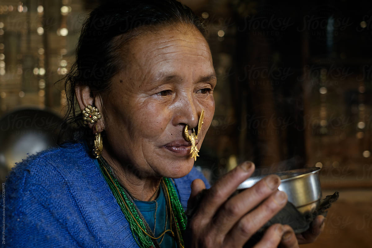 Elderly Nepali woman at rural home
