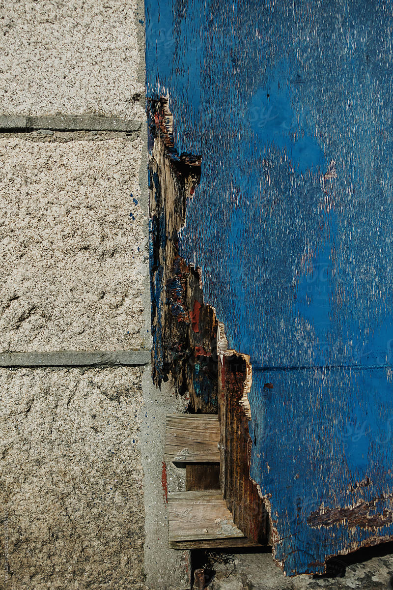 damaged wooden blue door