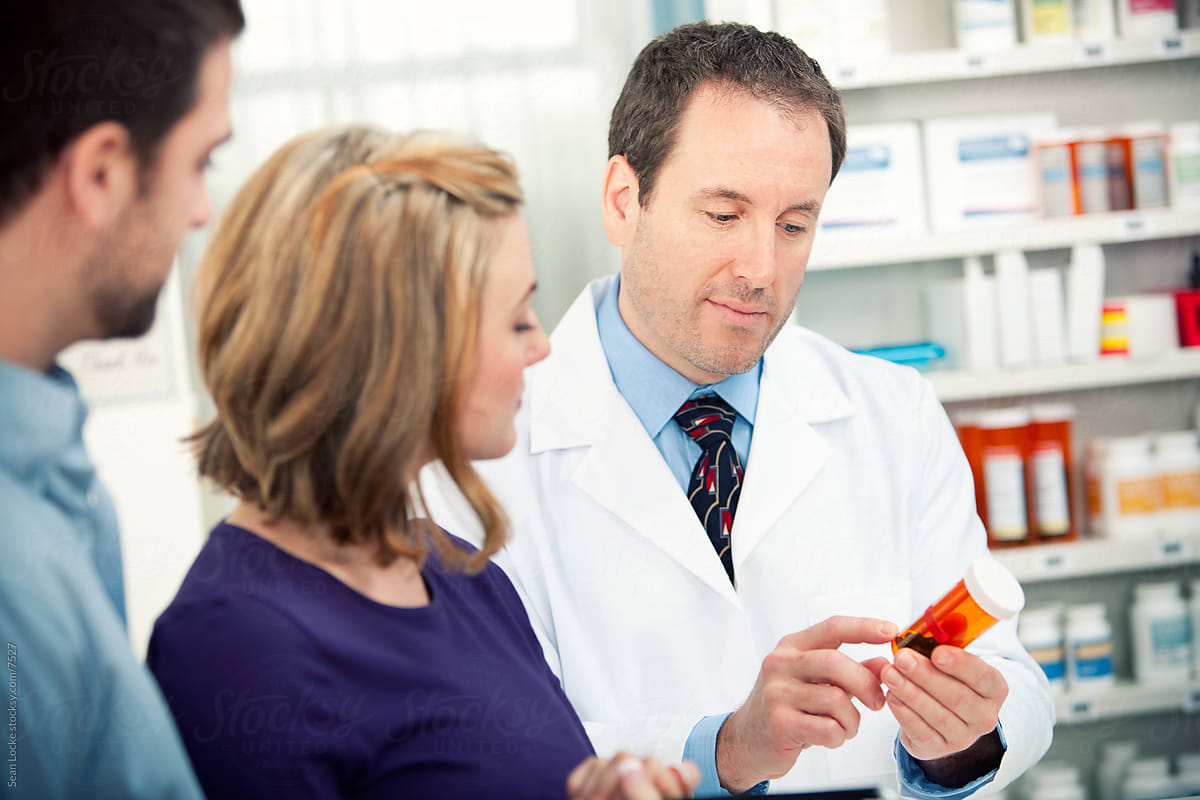 Pharmacy: Pharmacist Reading Instructions on Prescription