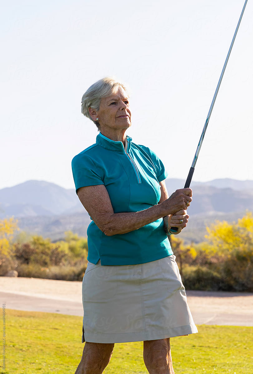 Athletic Senior Citizen Woman Playing Golf