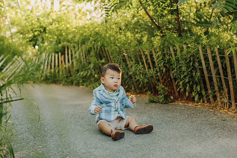 Korean Baby in front of Fence