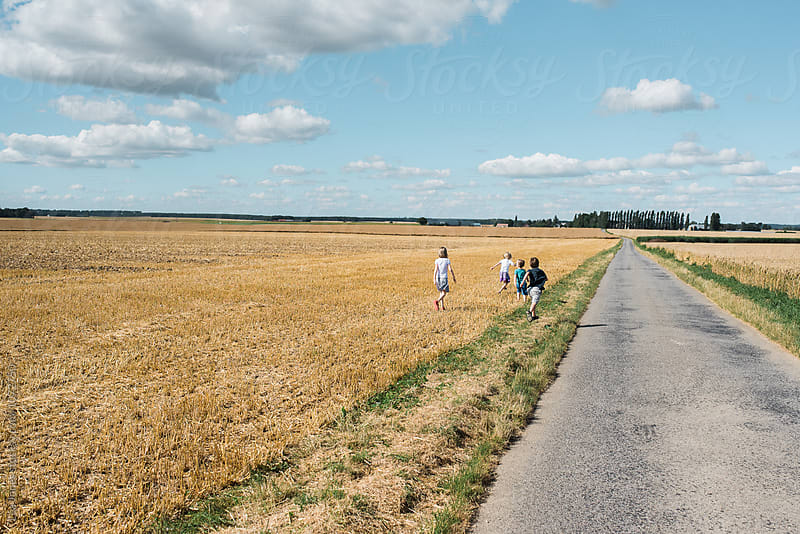 children on a walk in the summer