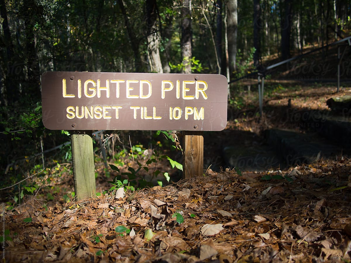Sign for lighted pier on the texas border