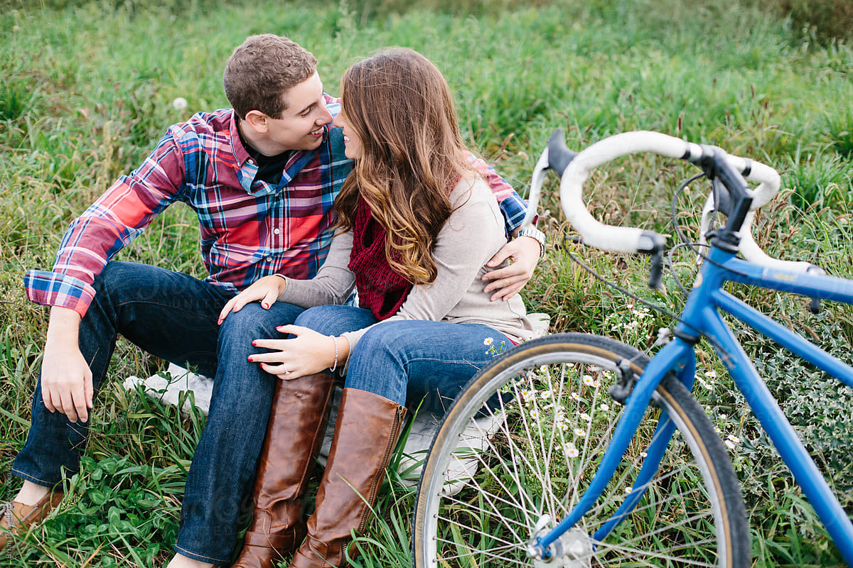 young couple with tandem bike