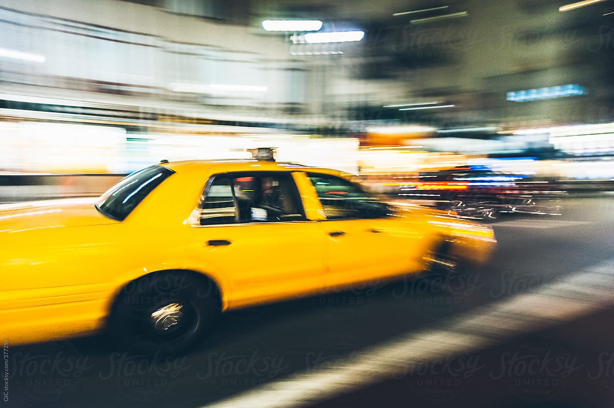 Fast Taxi car in Manhattan at night, New York City