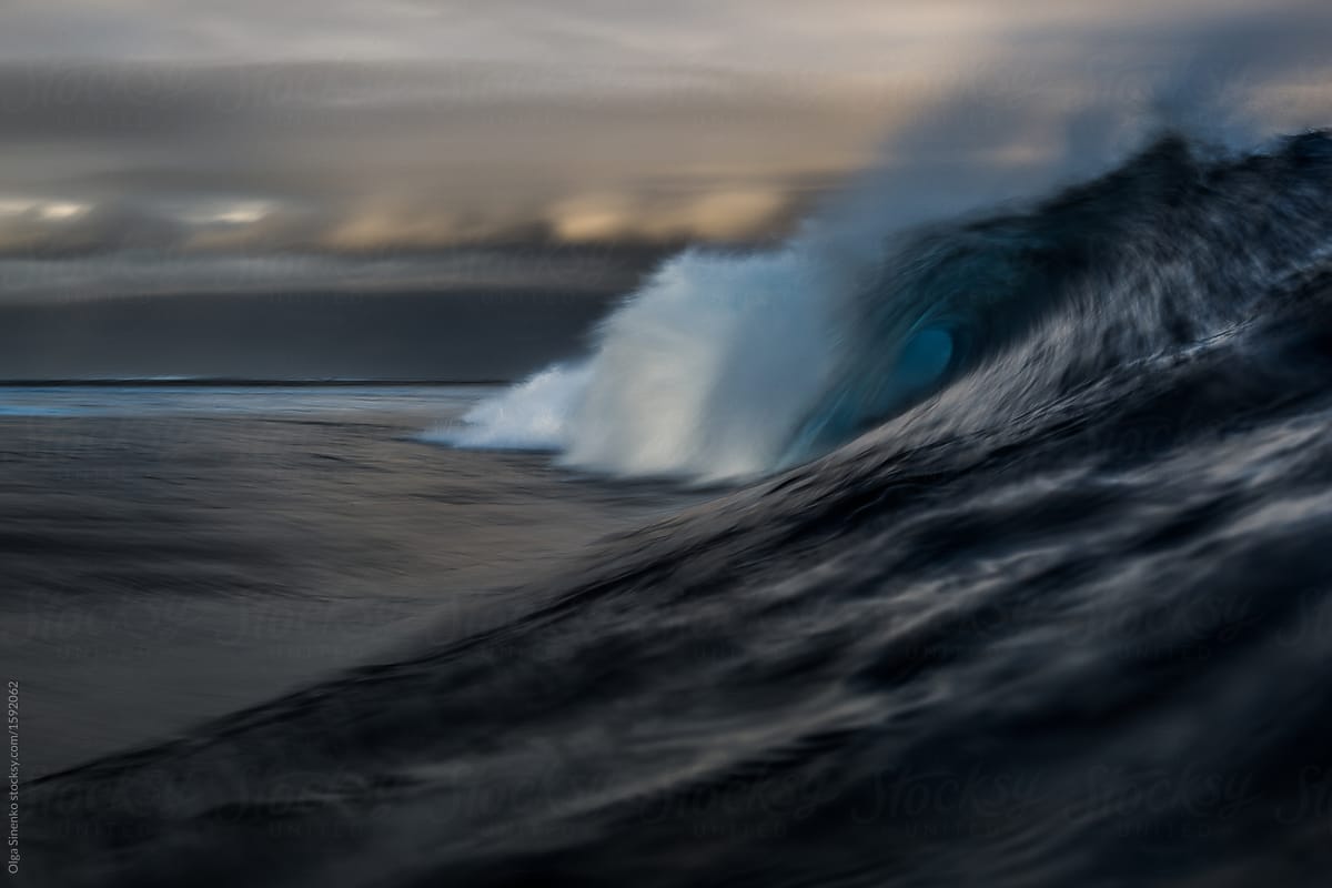 Beautiful dark ocean wave breaking at Fiji islands. Motion blur effect. Long Exposure Shot