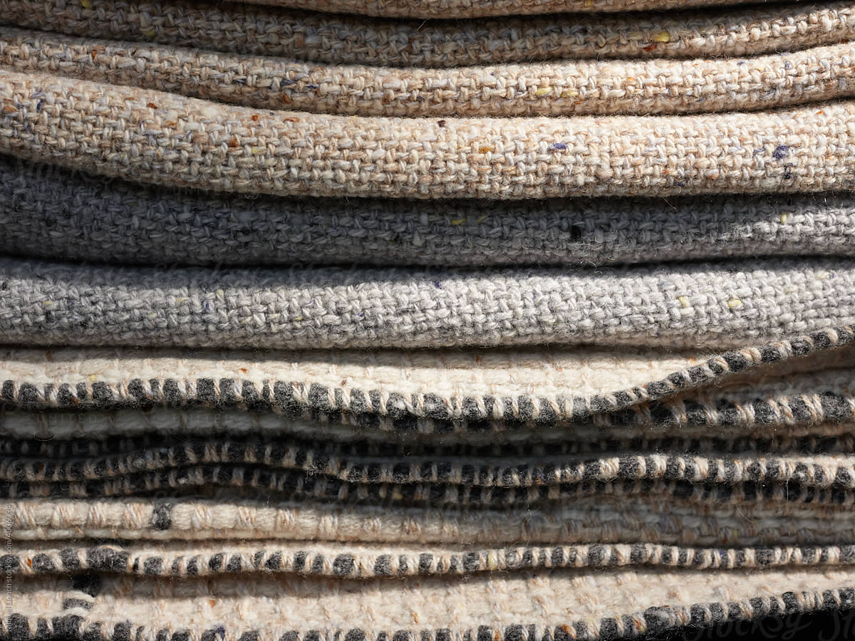 Stacked pile of soft woolen fabrics