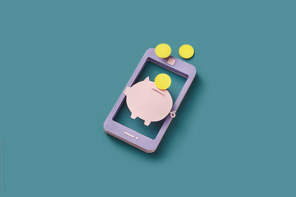 Smartphone with piggy bank and coins from paper.