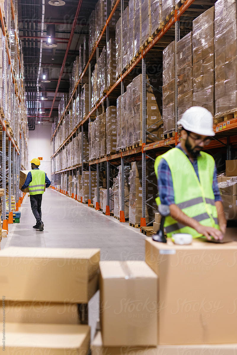 Joint work warehouse employees storage aisle