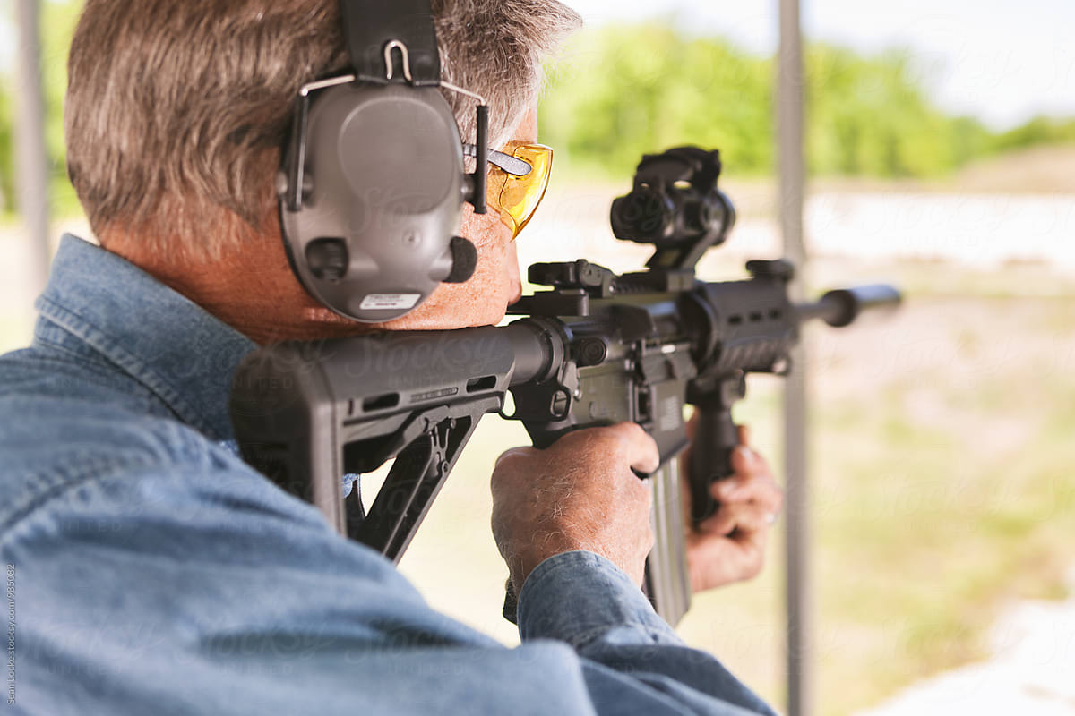Shooting: Man Taking Target Practice With An AR-15 Rifle