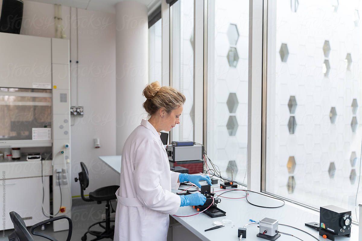 Female Scientist Working In Modern Lab