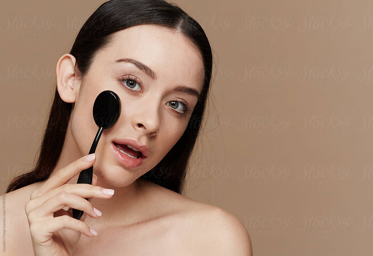 Closeup woman using silicone sponge