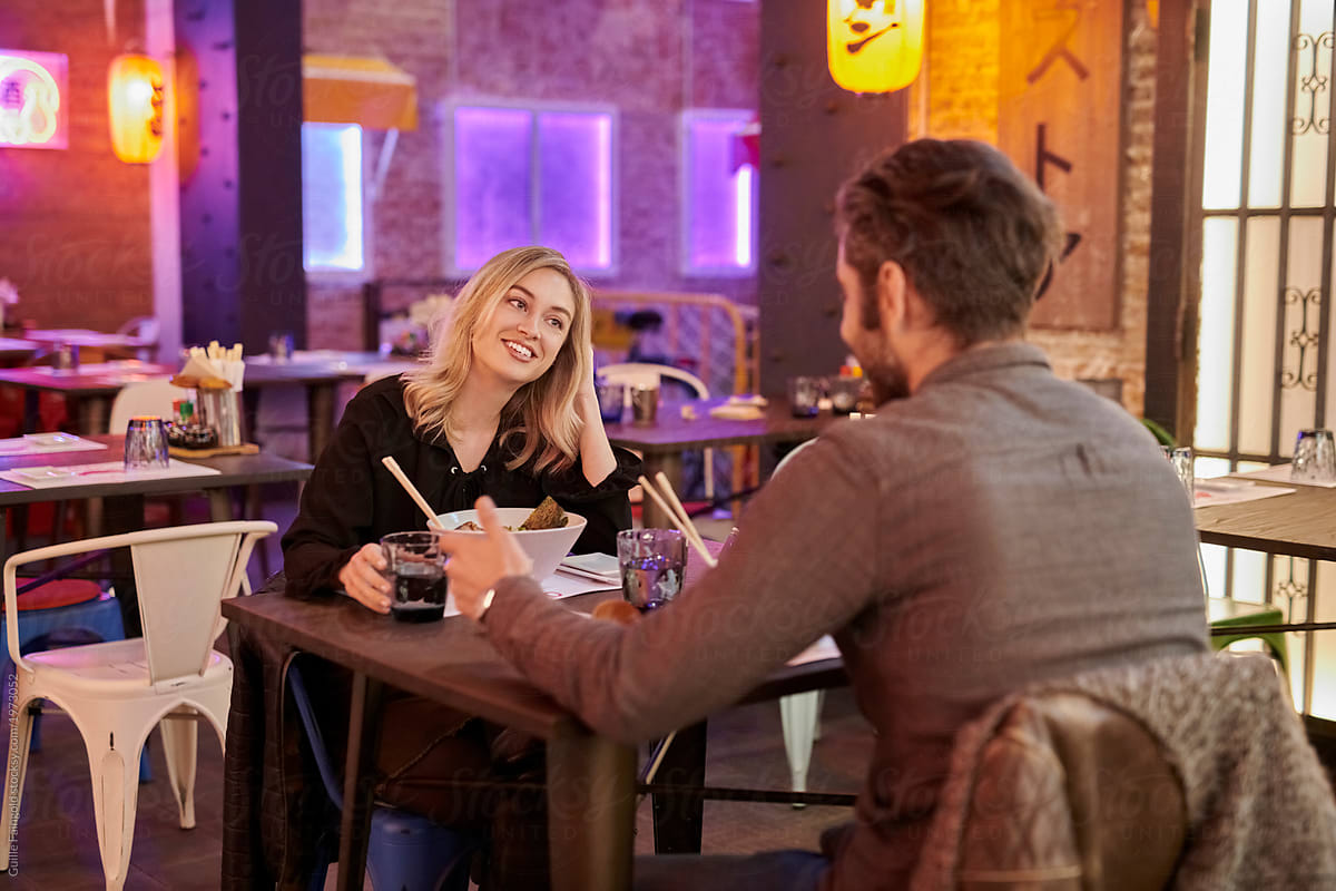 Happy Couple Eating In Cafe By Stocksy Contributor Guille Faingold Stocksy 4886