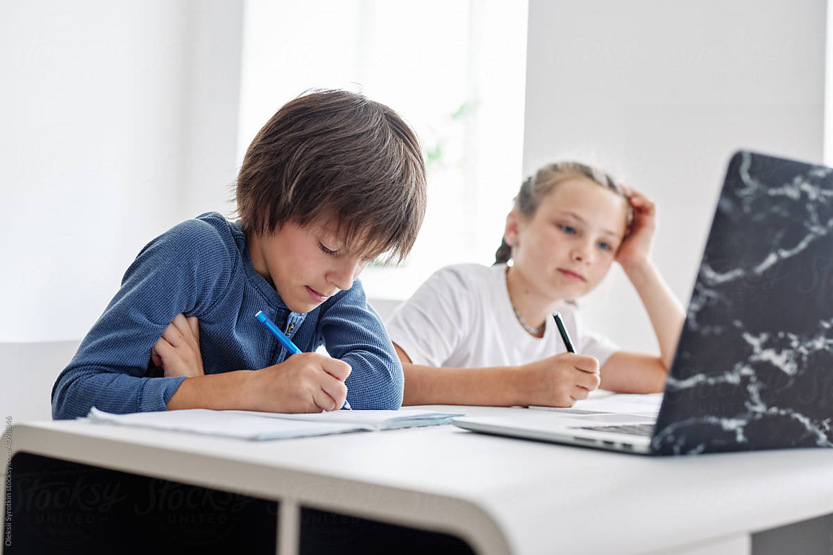 Children listening teacher during online lesson