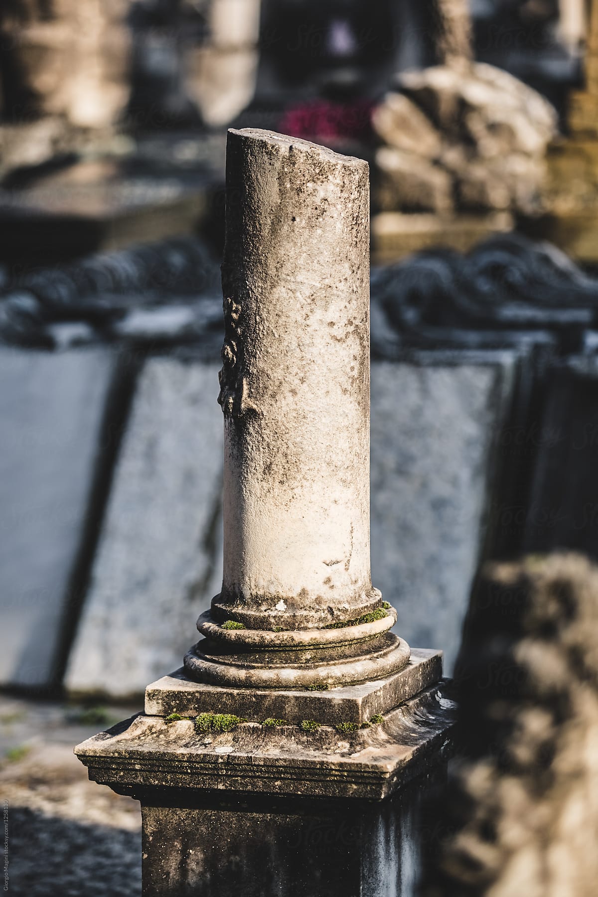 Broken Column on Burial in an Old Italian Cemetery