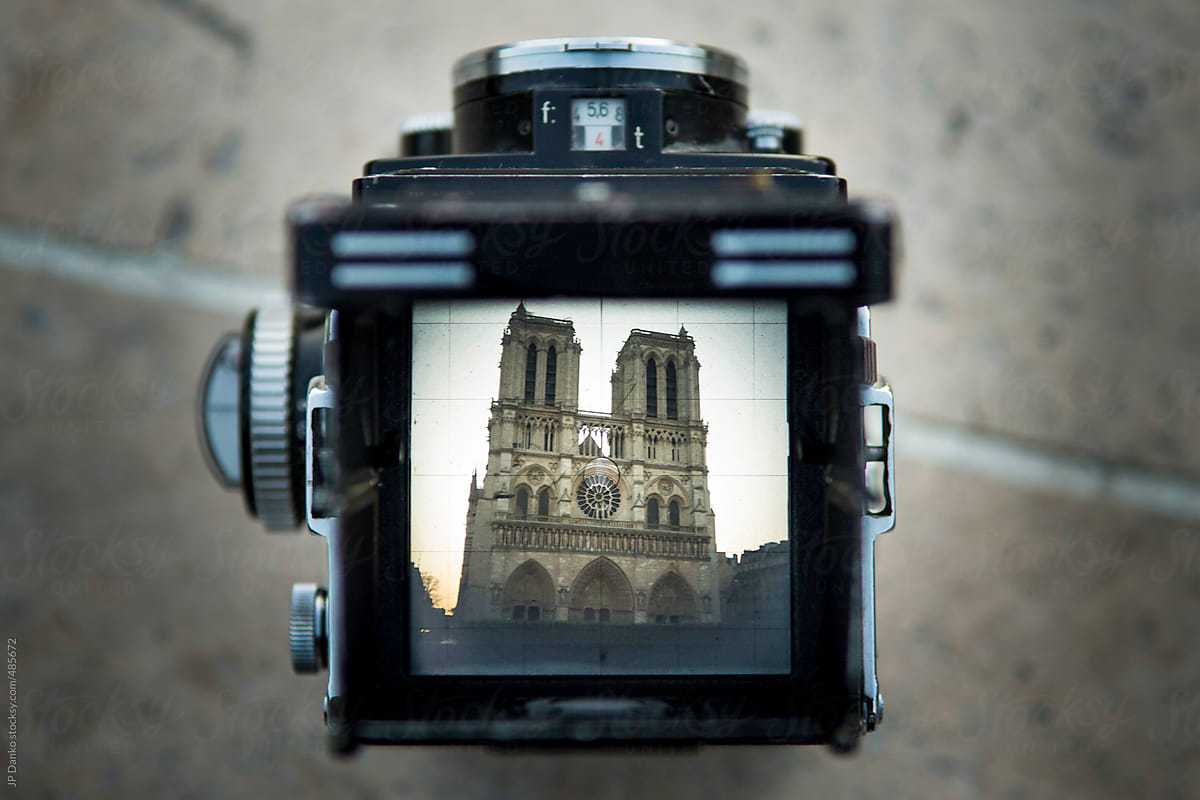 Vintage Film Medium Format Camera Photographing Front of Notre Dame de Paris