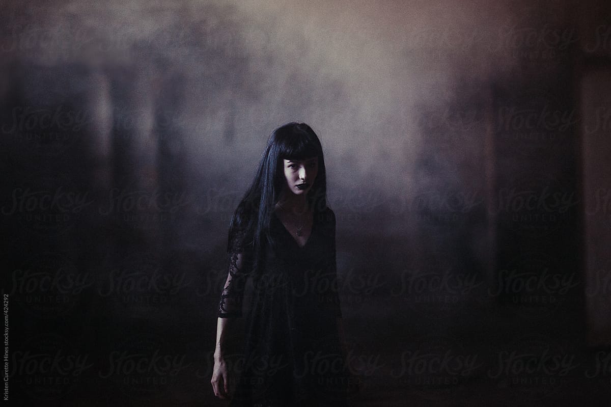 Gothic witch in black.