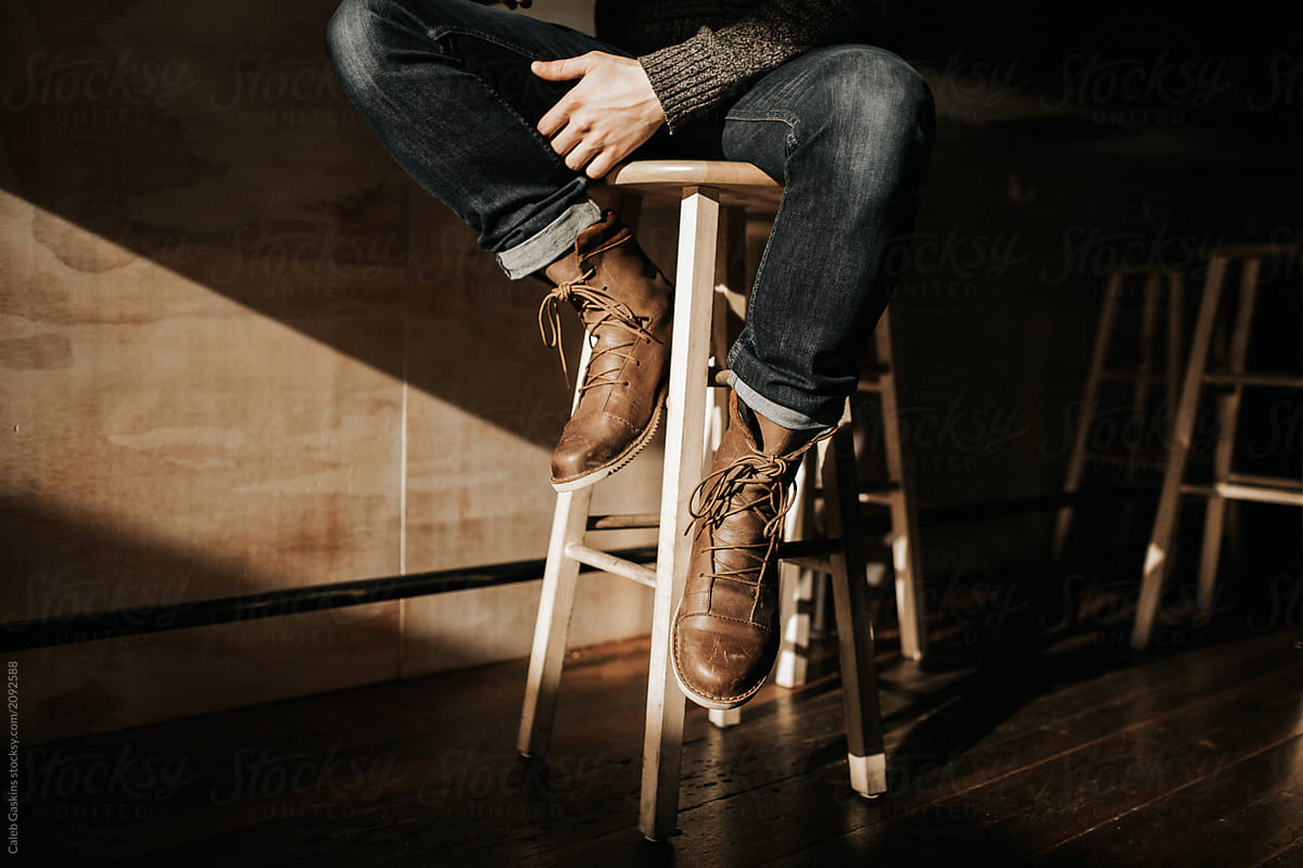 Man sitting on bar stool