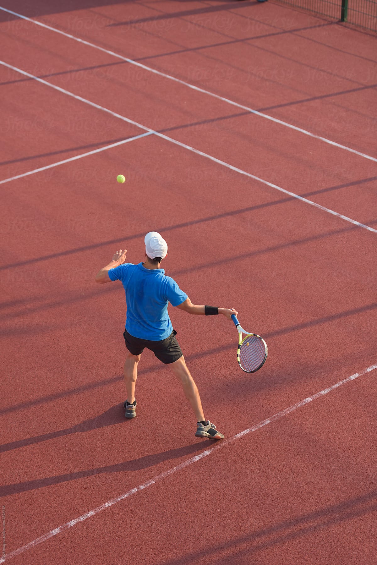 Tennis player doing a forehand stroke