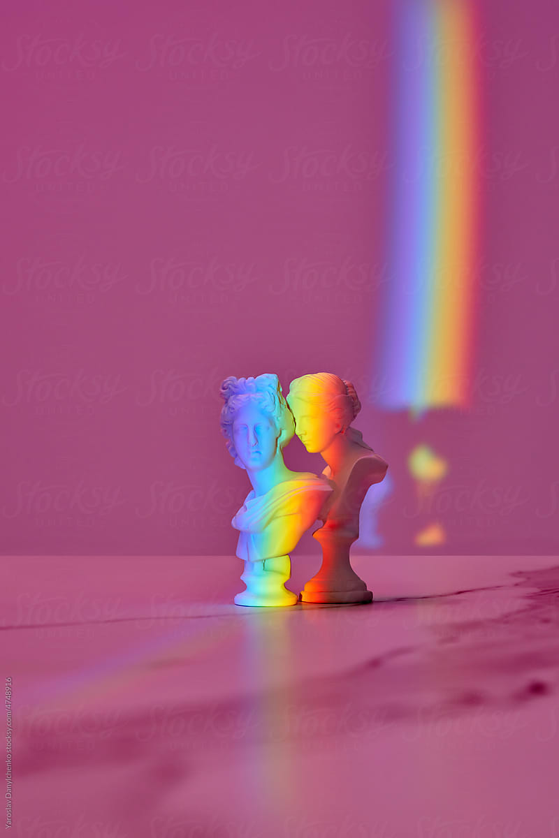 Rainbow effect over antique female busts.