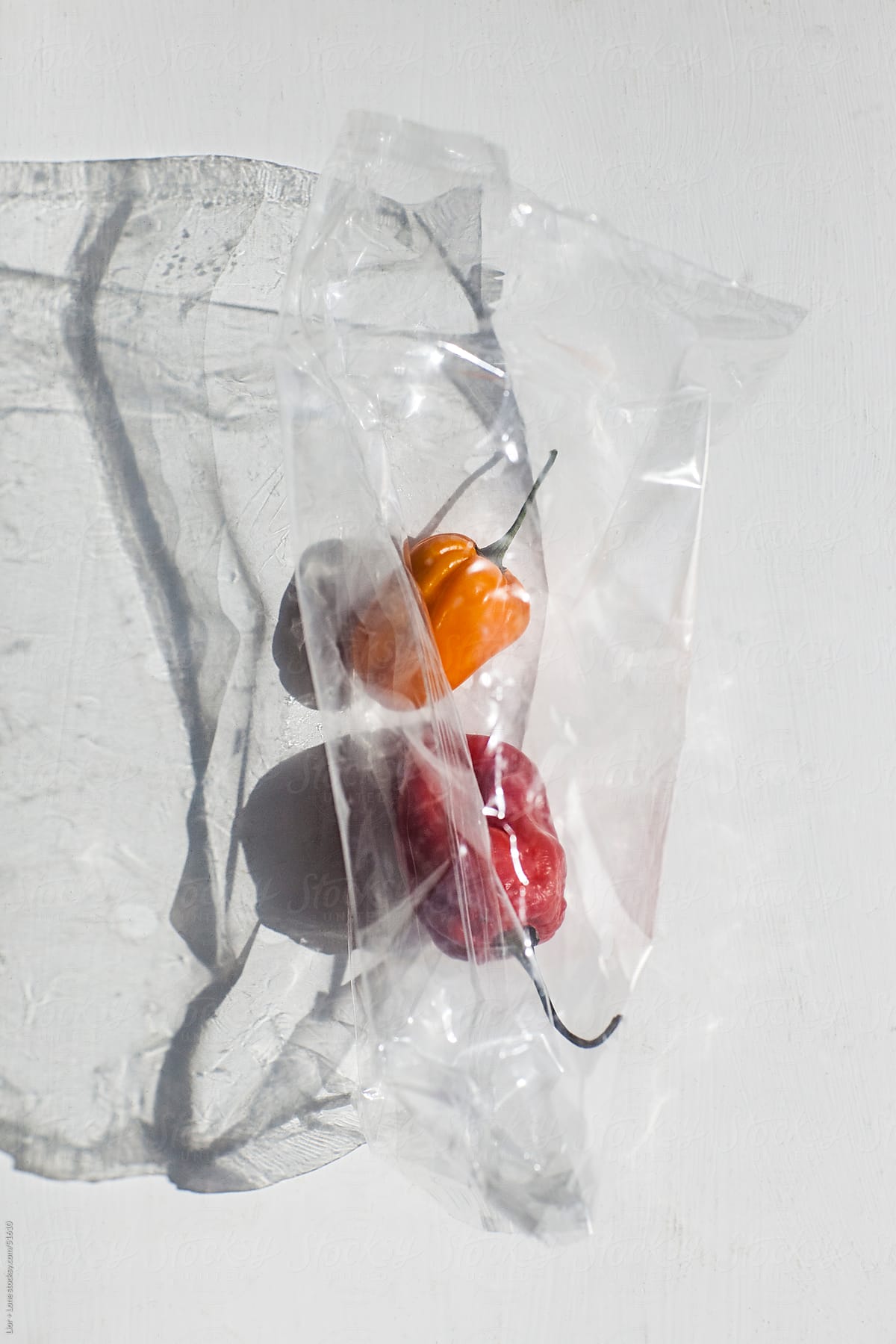 red and yellow habanero chilies in cellophane wrapping
