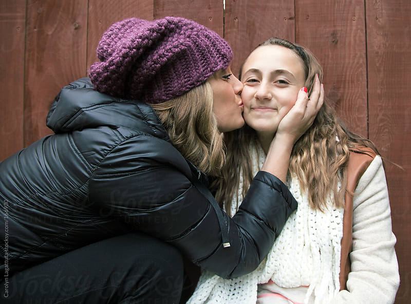 Mother Giving Her Teen Tween Daughter A Big Loving Kiss By Carolyn