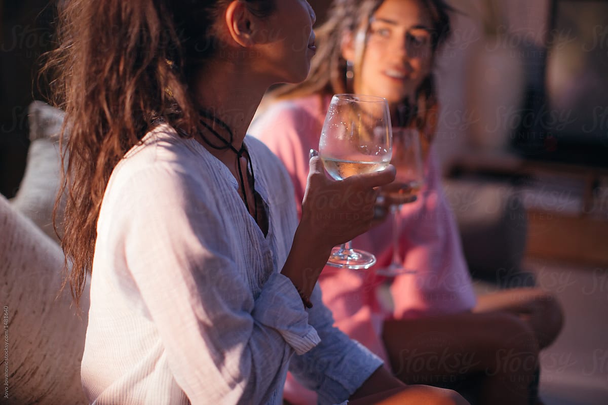 Hippie Girlfriends Enjoying Wine Night