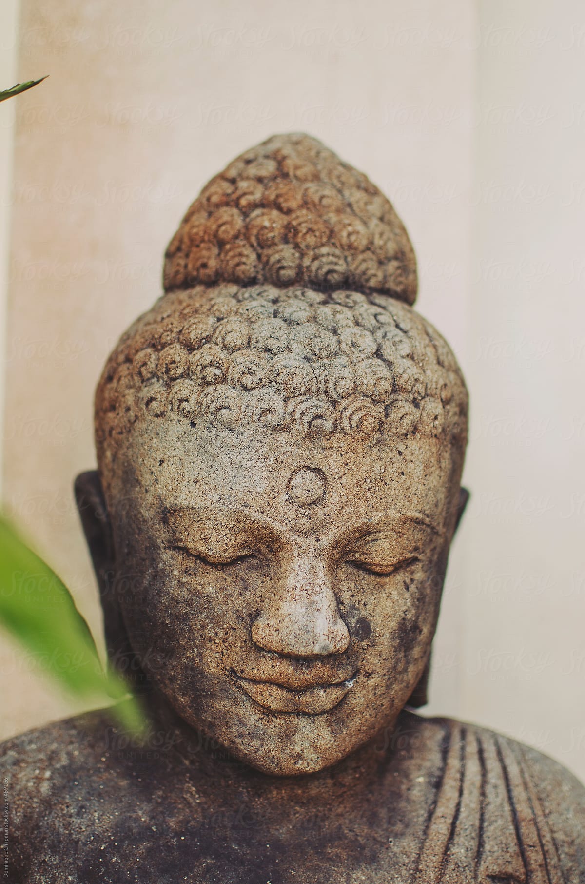 Close up of buddhist sculpture